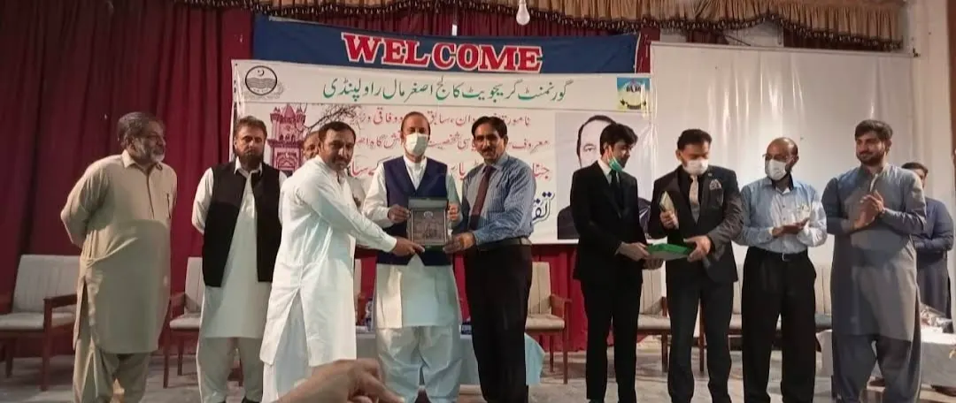 The college welcoming Senator Babar Awan