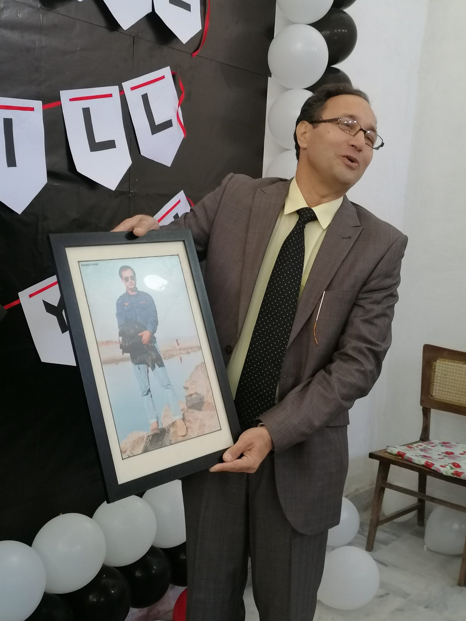 A framed memento presented at the farewell for a retiring faculty member