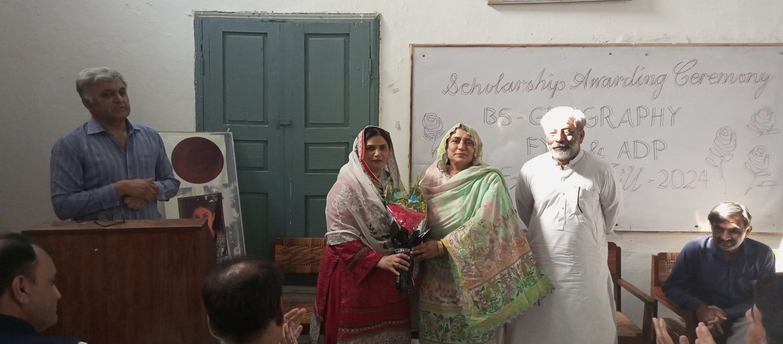 A token of appreciation exchanged at the Scholarship Awarding Ceremony